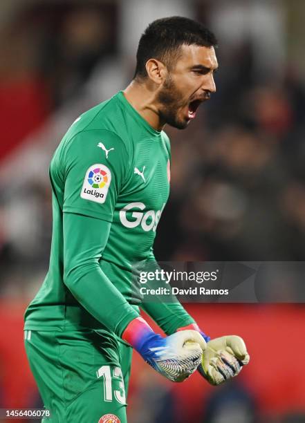 Paulo Gazzaniga of Girona FC celebrates after teammate Yangel Herrera scores the team's second goal during the LaLiga Santander match between Girona...