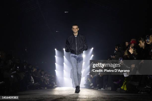 Model walks the runway at the Jordanluca fashion show during the Milan Menswear Fall/Winter 2023/2024 on January 14, 2023 in Milan, Italy.