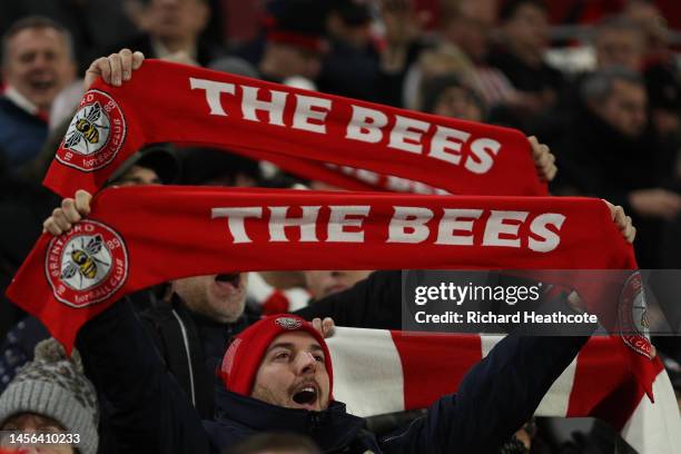 Fans of Brentford show their support with scarfs prior to the Premier League match between Brentford FC and AFC Bournemouth at Brentford Community...