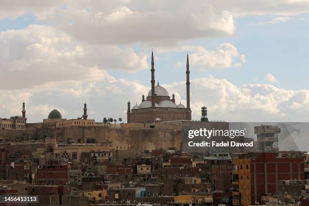 General view of the Muhammad Ali Mosque in Salah al-Din Citadel and popular houses on January 14, 2023 in Cairo, Egypt. The Egyptian pound suffered...