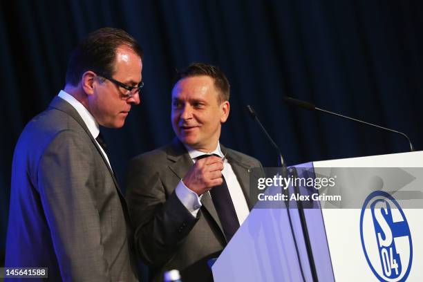 Manager Horst Heldt and CEO Clemens Toennies chat during the annual meeting of FC Schalke 04 at Emscher Lippe Halle on June 3, 2012 in Gelsenkirchen,...