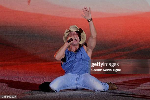 Kenny Chesney performs during Kenny Chesney and Tim McGraw 'Brothers of the Sun' Tour Kick-Off Concert at Raymond James Stadium on June 2, 2012 in...