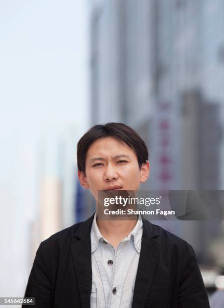 man portrait in wangfujing - wangfujing stock pictures, royalty-free photos & images