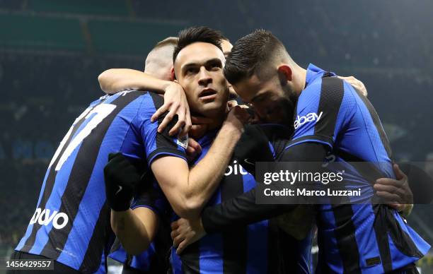 Lautaro Martinez of FC Internazionale celebrates with teammates after scoring the team's first goal during the Serie A match between FC...