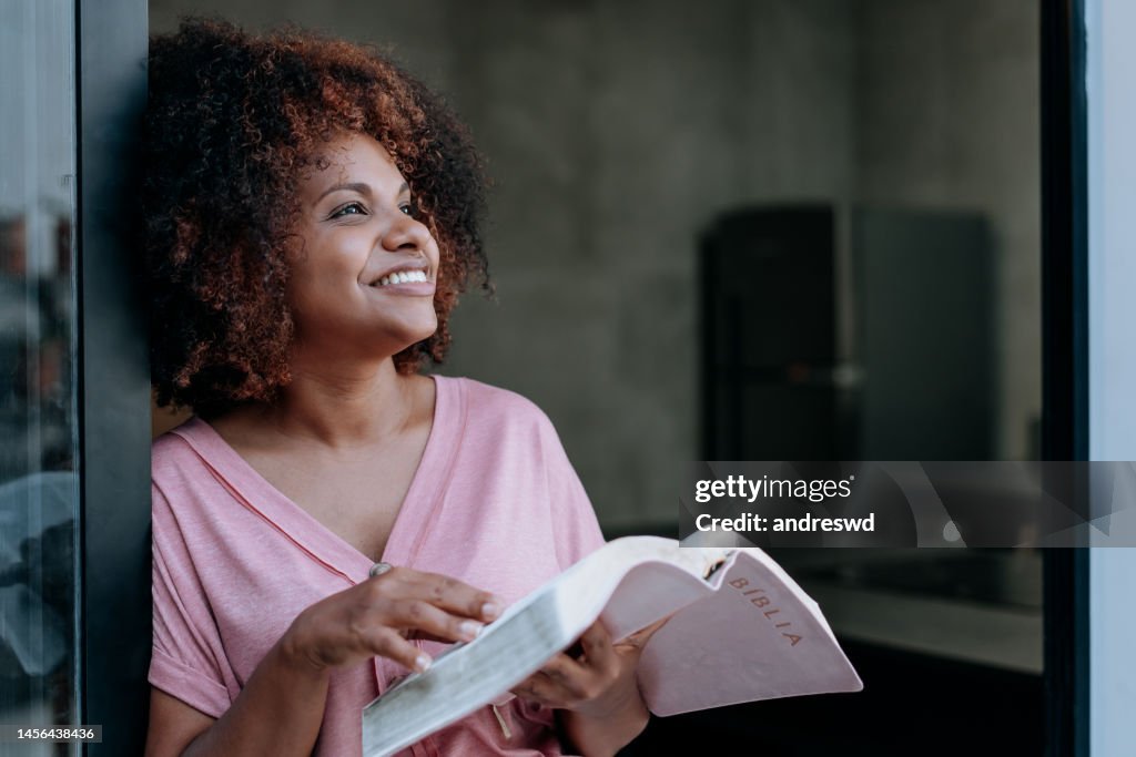 Woman reading the bible