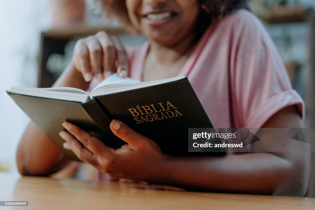 Woman reading the bible