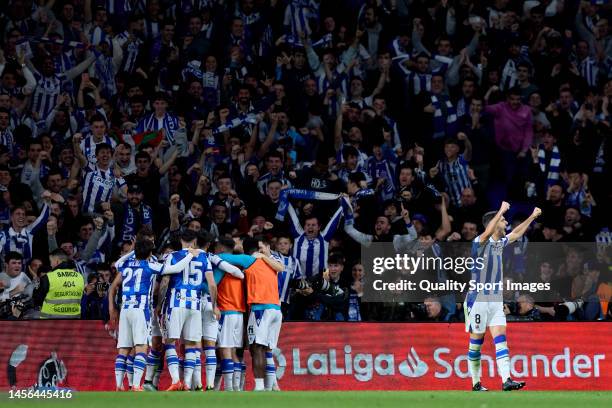 Mikel Oyarzabal of Real Sociedad celebrates with his teammates after scoring his team's third goal during the LaLiga Santander match between Real...