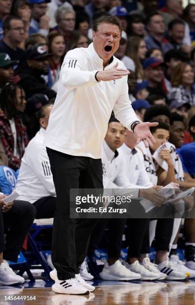 Head coach Bill Self of the Kansas Jayhawks instructs his team against the Iowa State Cyclones in the first half at Allen Fieldhouse on January 14,...