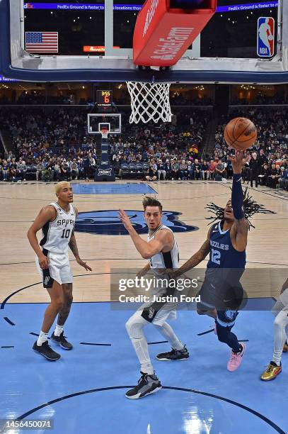 Ja Morant of the Memphis Grizzlies goes to the basket during the game against the San Antonio Spurs at FedExForum on January 11, 2023 in Memphis,...