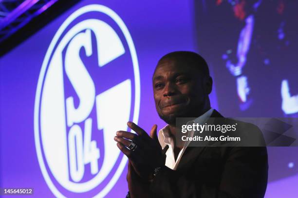 Gerald Asamoah reacts after being awarded member of the Schalke 'Hall of fame' during the annual meeting of FC Schalke 04 at Emscher Lippe Halle on...