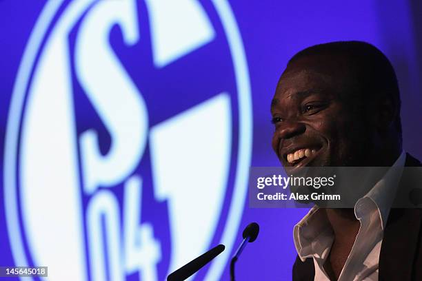 Gerald Asamoah reacts after being awarded member of the Schalke 'Hall of fame' during the annual meeting of FC Schalke 04 at Emscher Lippe Halle on...