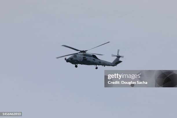 overhead navy helicopter - attack helicopter stock pictures, royalty-free photos & images