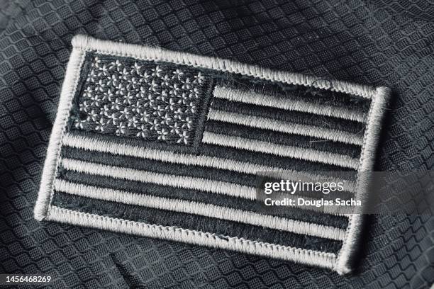 flag patch on a covert military uniform - police uniform stock pictures, royalty-free photos & images