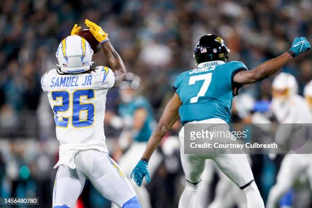 Asante Samuel Jr. #26 of the Los Angeles Chargers intercepts a pass against the Jacksonville Jaguars during the first quarter of the game in the AFC...