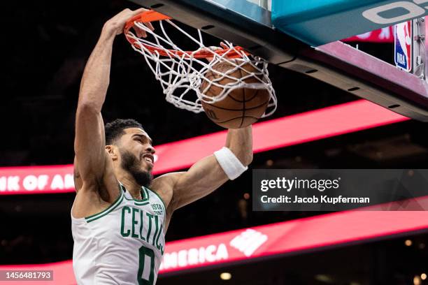 Jayson Tatum of the Boston Celtics dunks the ball in the fourth quarter during their game against the Charlotte Hornets at Spectrum Center on January...