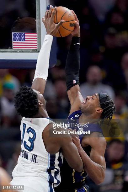 Jaren Jackson Jr. #13 of the Memphis Grizzlies blocks a shot attempt by Buddy Hield of the Indiana Pacers in the third quarter at Gainbridge...