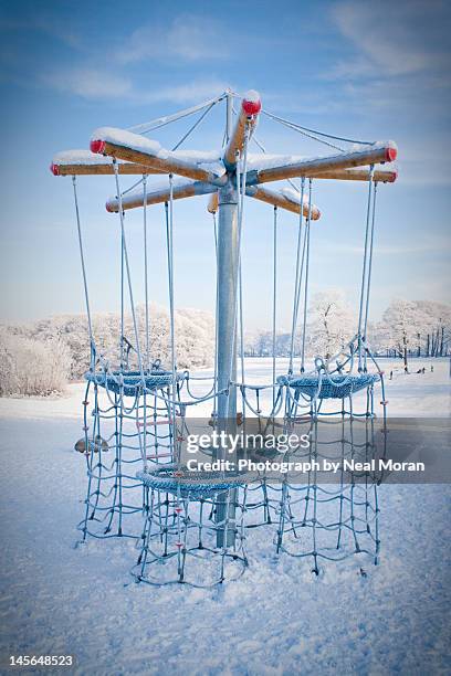 rope climbing frame in winter - climbing frame stock pictures, royalty-free photos & images