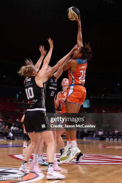 Tianna Hawkins of the Fire drives to the basket during the round 10 WNBL match between Sydney Flames and Townsville Fire at Qudos Bank Arena on...