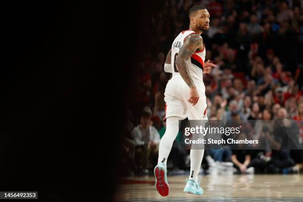 Damian Lillard of the Portland Trail Blazers reacts after his three-point basket during the second quarter of the game against the Dallas Mavericks...