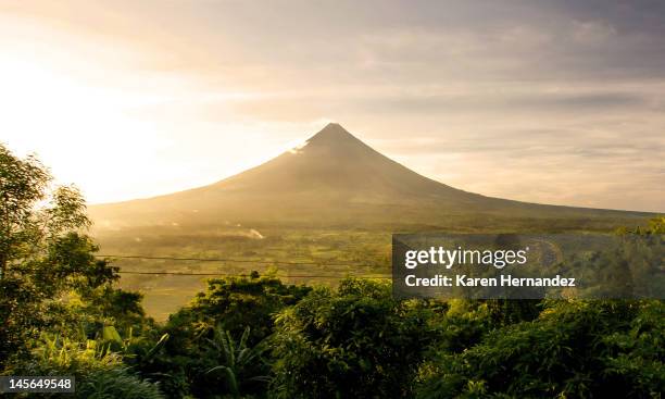 mayon volcano in late afternoon light - philippines volcano stock pictures, royalty-free photos & images