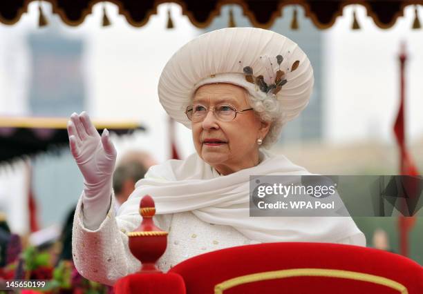 Queen Elizabeth II waves from the Spirit of Chartwell during the Diamond Jubilee Thames River Pageant on June 3, 2012 in London, England. For only...