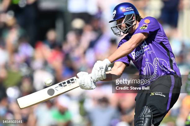 Tim David of the Hurricanes hits a six during the Men's Big Bash League match between the Hobart Hurricanes and the Sydney Thunder at Blundstone...
