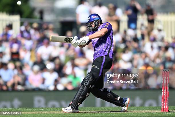 Tim David of the Hurricanes hits a six during the Men's Big Bash League match between the Hobart Hurricanes and the Sydney Thunder at Blundstone...