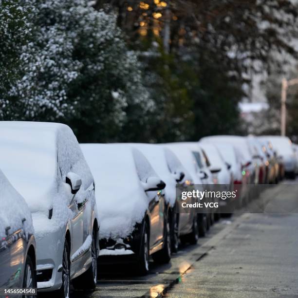 Cars are covered by snow on January 15, 2023 in Wuhan, Hubei Province of China.