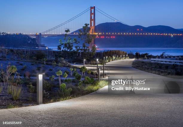 golden gate bridge over san francisco bay at sunset - the presidio stock pictures, royalty-free photos & images