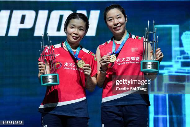 Chen Qingchen and Jia Yifan of China pose with their medals on the podium after the Women's Double Final match against Baek Ha Na and Lee Yu Lim of...