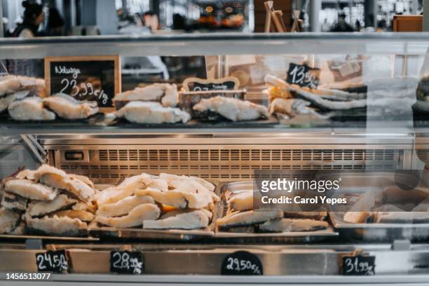 dry cod for sale in market stall in porto,portugal - dried fish stock pictures, royalty-free photos & images