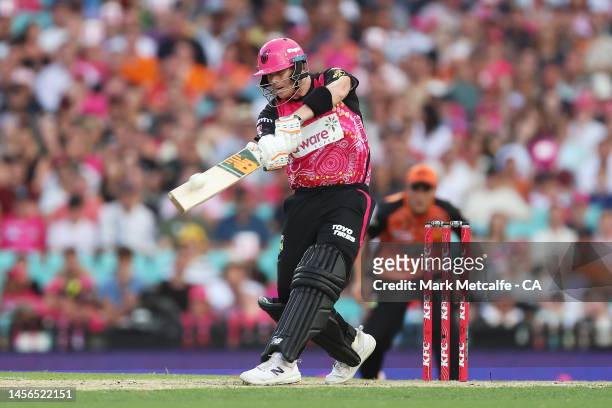 Steve Smith of the Sixers hits a six during the Men's Big Bash League match between the Sydney Sixers and the Perth Scorchers at Sydney Cricket...