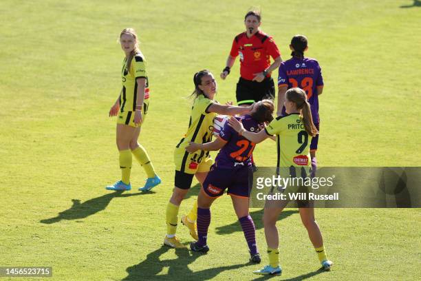 Emma Rolston of the Phoenix fouls Ella Mastrantonio of the Glory during the round 10 A-League Women's match between Perth Glory and Wellington...
