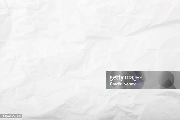 white wrinkle paper texture background - wrinkled stockfoto's en -beelden