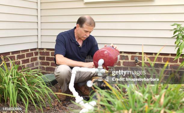 well pump - putten stockfoto's en -beelden