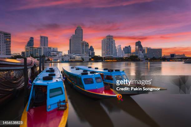 river taxi view on the river in bangkok city, transportation boat at sathorn pier, many people decide to work with boat, bangkok, thailand - river chao phraya stock pictures, royalty-free photos & images