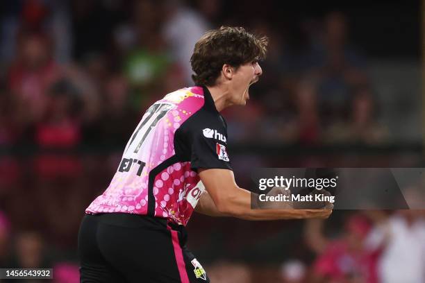 Sean Abbott of the Sixers celebrates taking the wicket of Nick Hobson of the Scorchers during the Men's Big Bash League match between the Sydney...