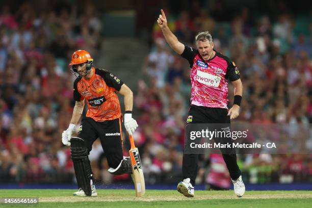 Dan Christian of the Sixers celebrates taking the wicket of Andrew Tye of the Scorchers during the Men's Big Bash League match between the Sydney...