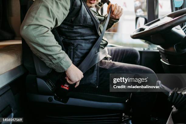 professional truck driver - seat belt stock pictures, royalty-free photos & images
