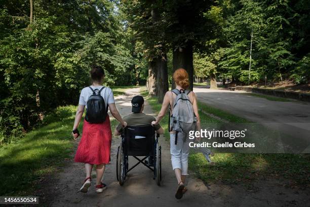 After 3 months of hospitalization, Danylo, enjoy his first permission to go out from the hospital to walk in a park with his fiancée Yevhenia and his...