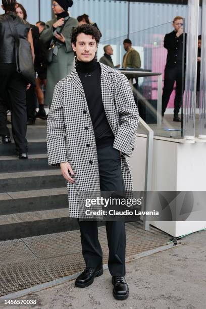 Adam DiMarco is seen arriving at the Prada fashion show during the Milan Menswear Fall/Winter 2023/2024 on January 15, 2023 in Milan, Italy.