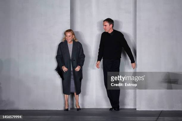Fashion designers Miuccia Prada & Raf Simons walks the runway at the Prada fashion show during the Milan Menswear Fall/Winter 2023/2024 on January...