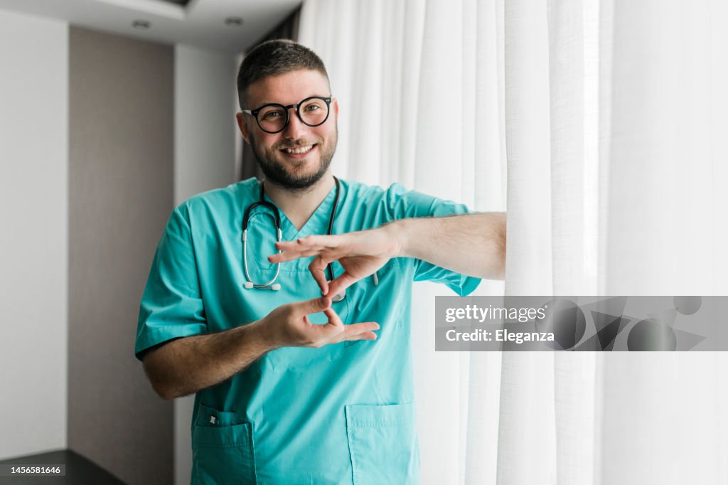 Provider Sign Language Doctor Communicating Using Sign Language High-Res Stock Photo - Getty ...