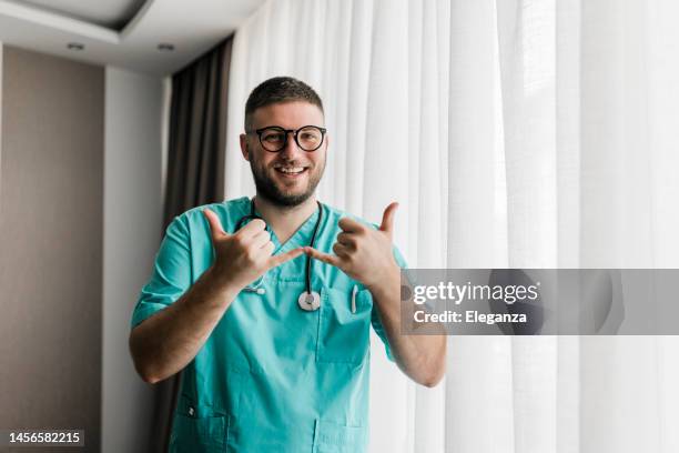 238 Doctor Using Sign Language Stock Photos, High-Res Pictures, and ...
