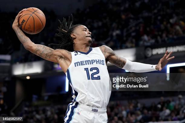 Ja Morant of the Memphis Grizzlies dunks the ball in the third quarter against the Indiana Pacers at Gainbridge Fieldhouse on January 14, 2023 in...