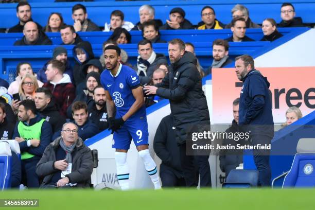 Pierre-Emerick Aubameyang of Chelsea looks on alongside Graham Potter, Manager of Chelsea during the Premier League match between Chelsea FC and...