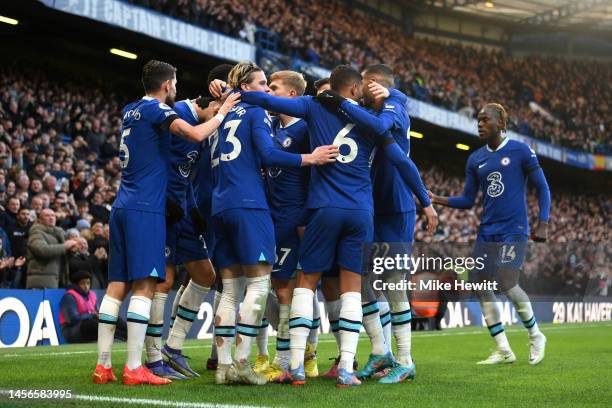 Kai Havertz of Chelsea celebrates with teammates after scoring the team's first goal during the Premier League match between Chelsea FC and Crystal...