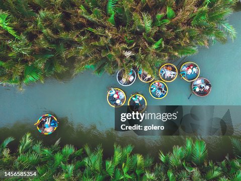 Drone view on colorful roundboats on lagoon in hoi an, vietnam Drone view on colorful roundboats on lagoon in hoi an, vietnam