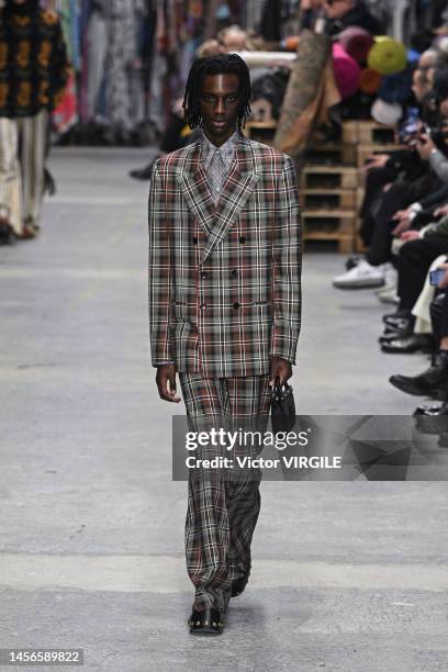 Model walks the runway during the Etro Ready to Wear Fall/Winter 2023-2024 fashion show as part of the Milan Men Fashion Week on January 15, 2022 in...