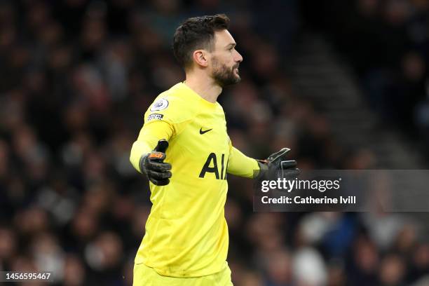 Hugo Lloris of Tottenham Hotspur reacts after scoring an own goal during the Premier League match between Tottenham Hotspur and Arsenal FC at...